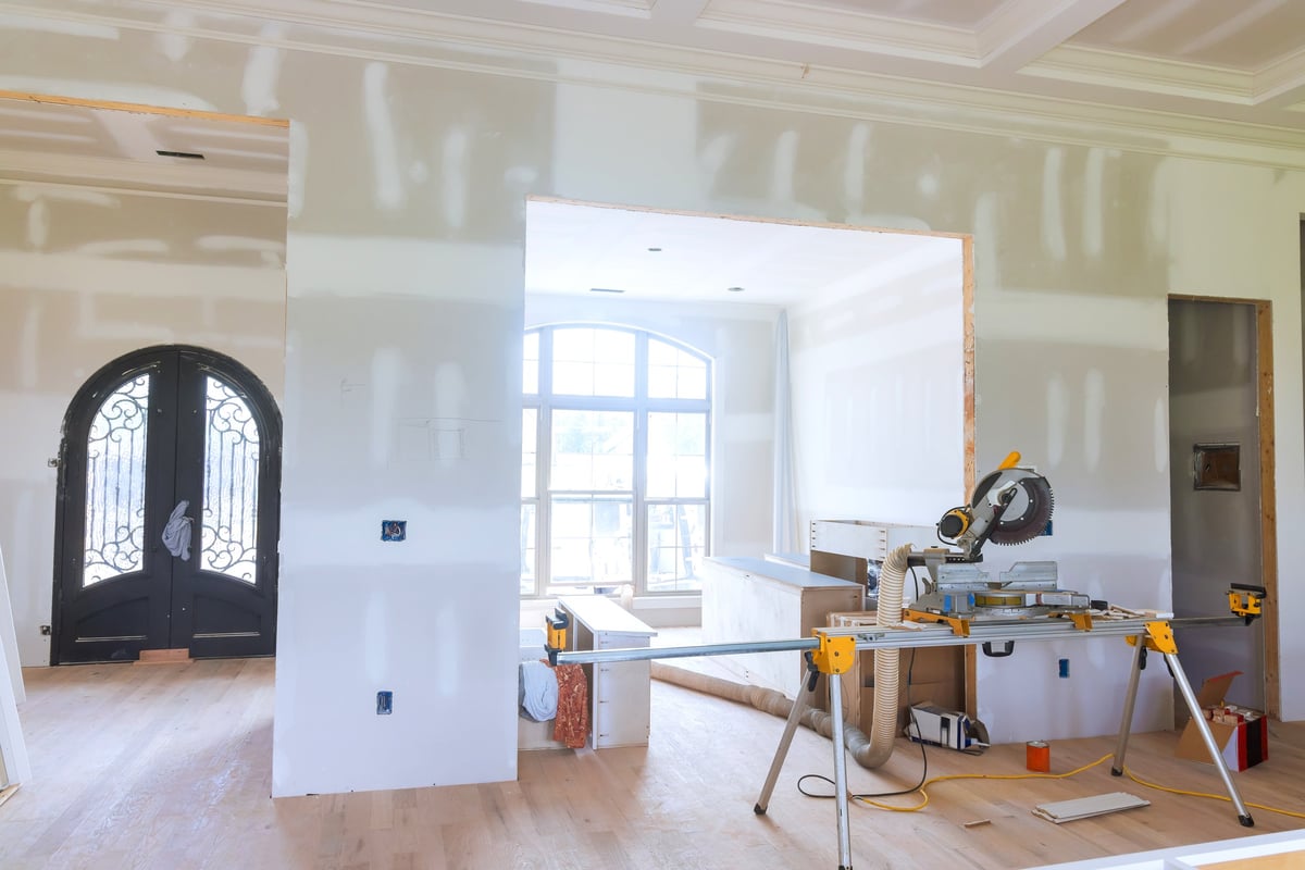 Home under renovation with tools and unfinished walls